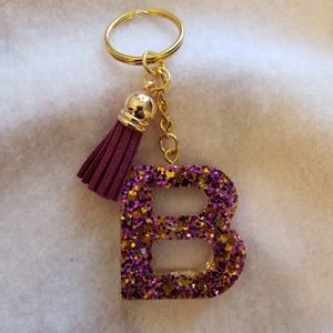 Custom keychains/purple 💜 and gold